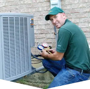 A man is working on an air conditioner.